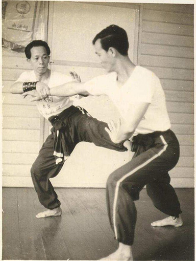 Sifu Ho Fatt Nam on the left sparring